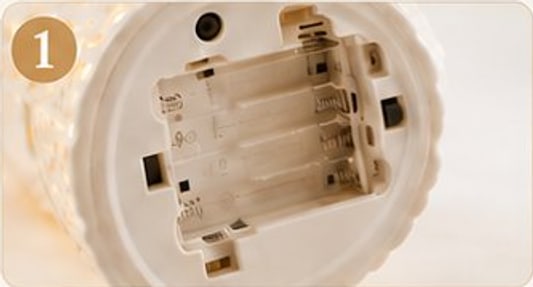 Batterirom under foten